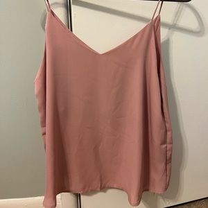 Blush colored blouse from a boutique